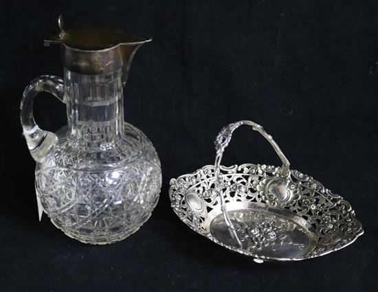 An Edwardian silver mounted class claret jug and a continental 800 standard pierced basket. claret jug 20.5cm.